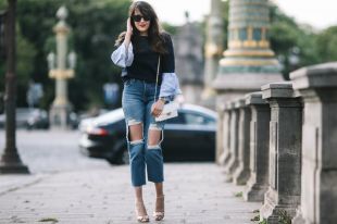 Трендовые джинсы с дырками на коленках: харизма и небрежность в деталях
