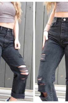 Рваные черные джинсы