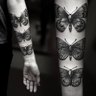 Женская татуировка бабочки на руке